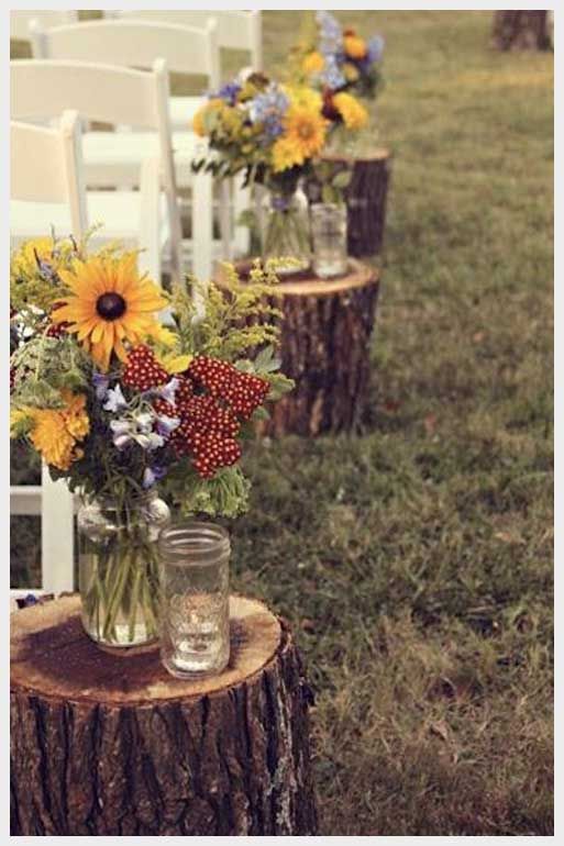 rustic outdoor wedding aisle ideas-sunflowers and wildflowers in mason jars