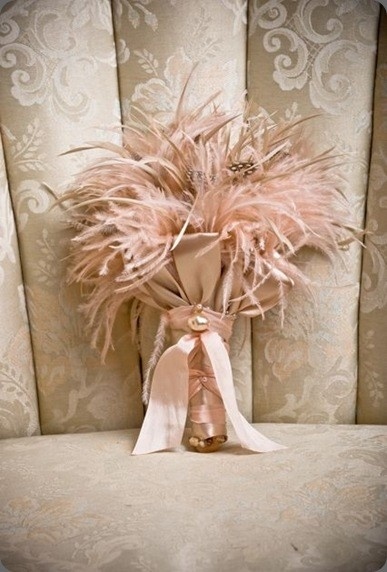 Elegant dusty pink feathers bridesamid bouquet