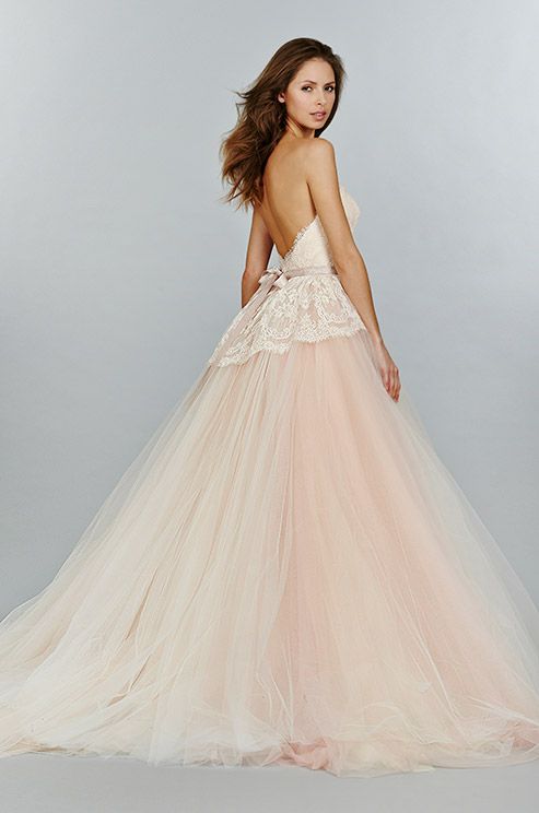 blush pink wedding dress features beautiful lace bodice and tulle skirt