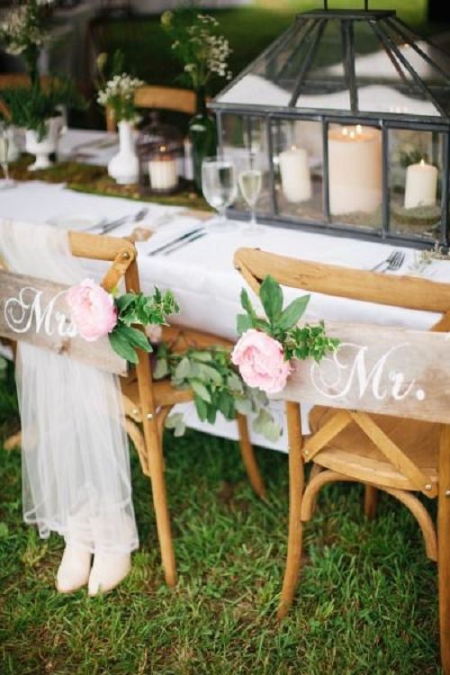 Bride & Groom chairs with tulle and flowers