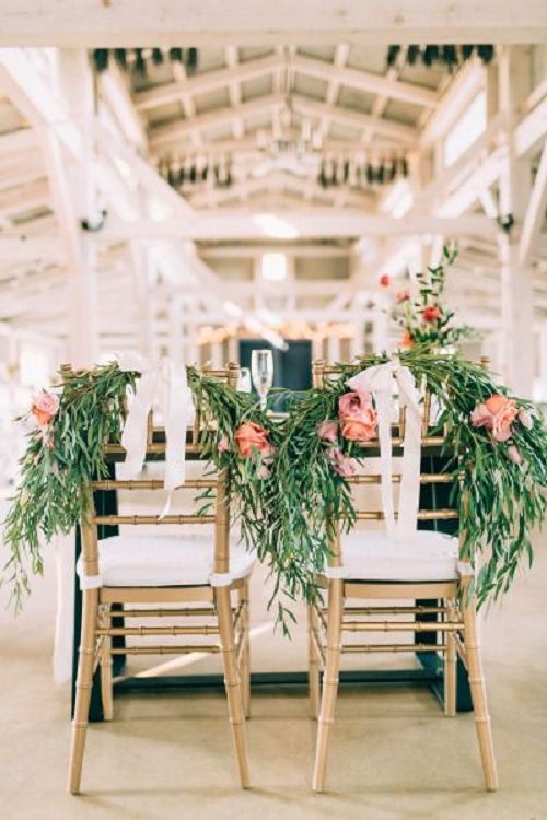 Olive branch and peony sweetheart chairs