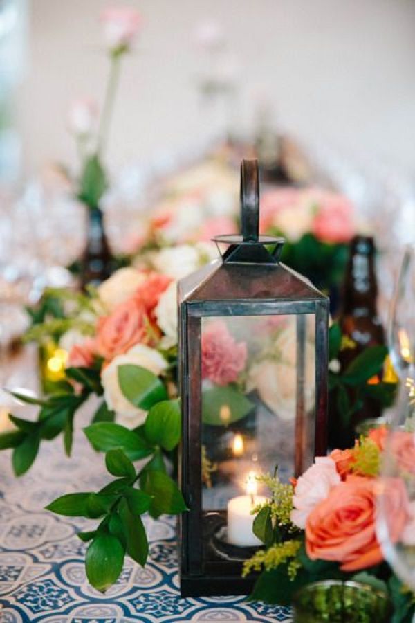 black lantern and pink roses wedding centerpiece