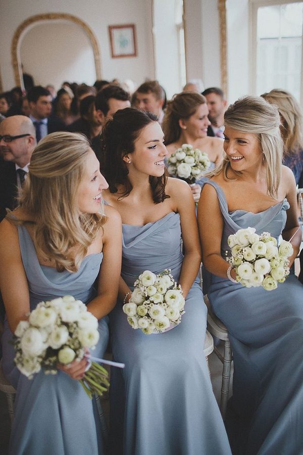 dusty blue bridemaids dresses with one shoulder draped neckline and flowy body