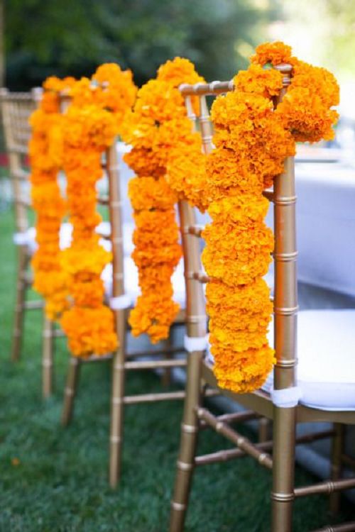 orange flowers wedding chair