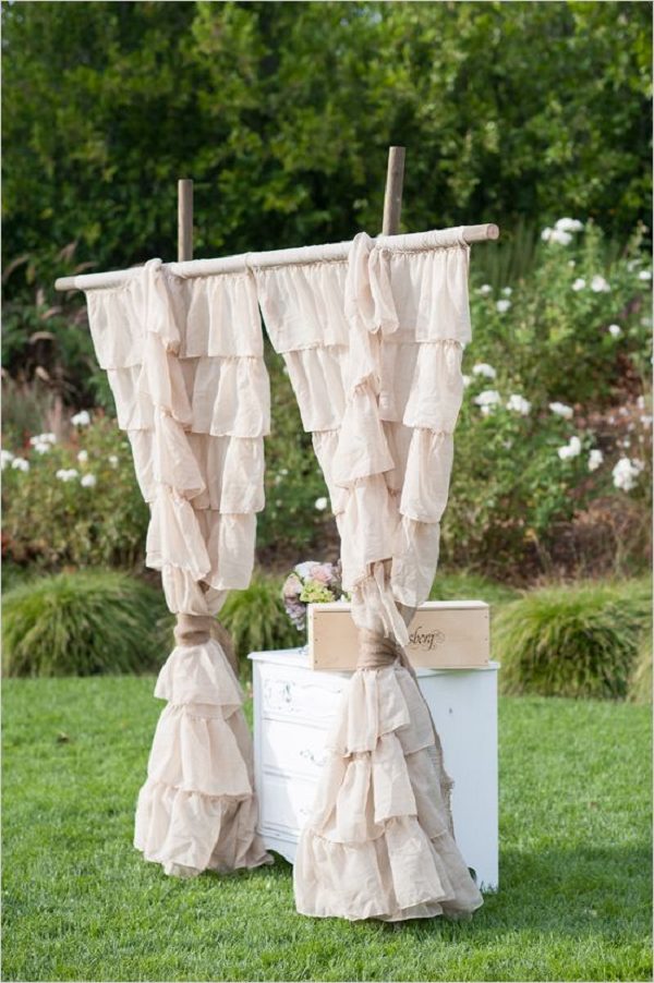 ruffled burlap wedding backdrop idea