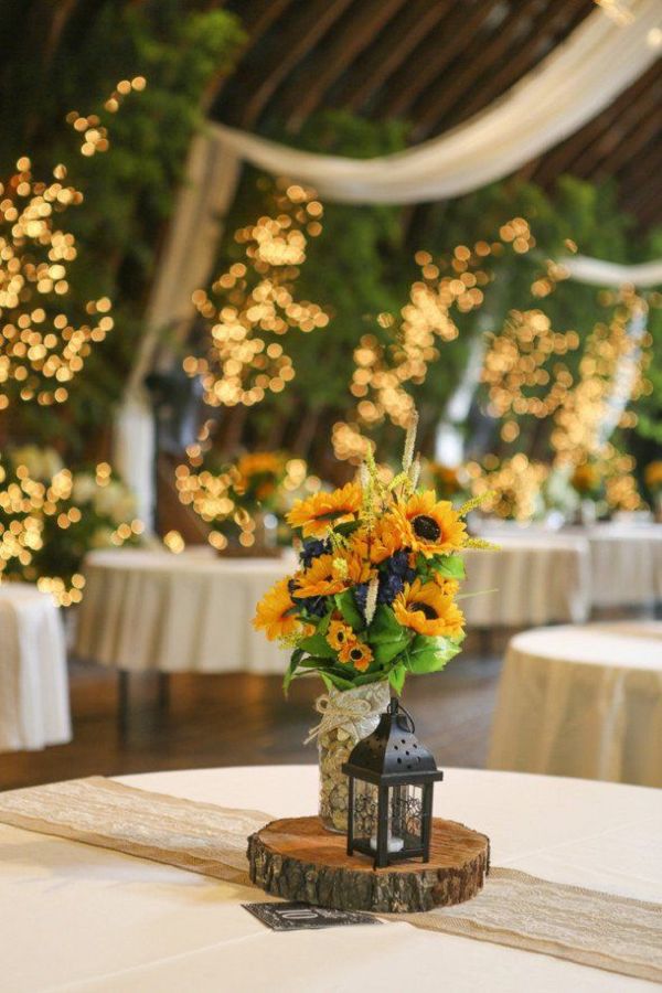 rustic sunflowers and black lantern wedding centerpiece