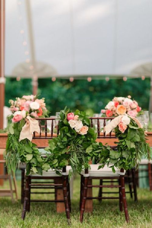 spring wedding chair with green and pink flowers decor