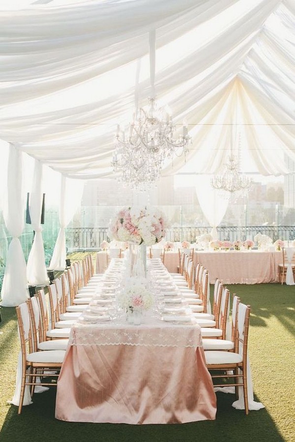 Rose gold table linens and white drapes wedding tent ideas