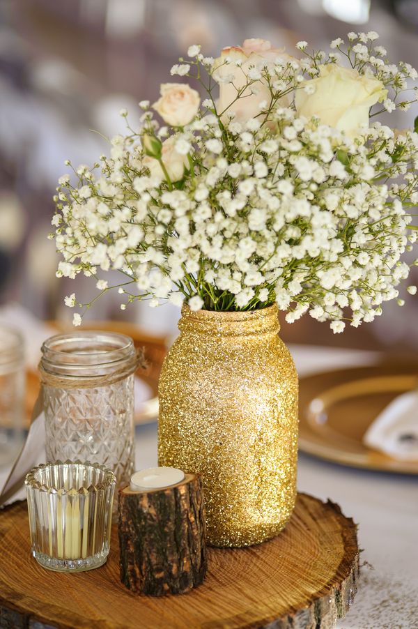 rustic gold glitter mason jar wood stump wedding centerpiece