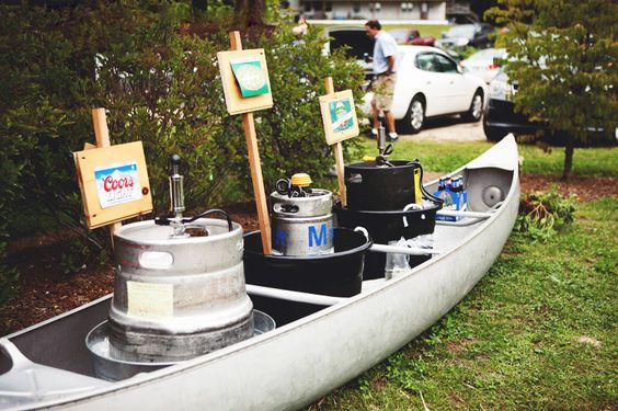 A canoe filled with drinks at a wedding