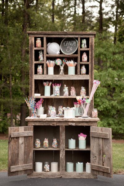 adorable candy bar with recycled tin cans and mason jars
