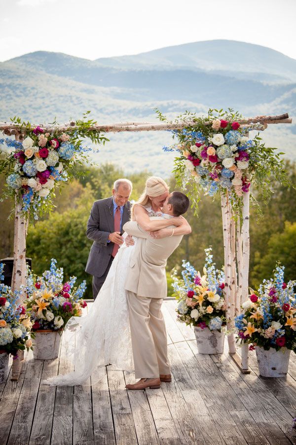colorful rose and baby blue hydrangea wedding arch ideas