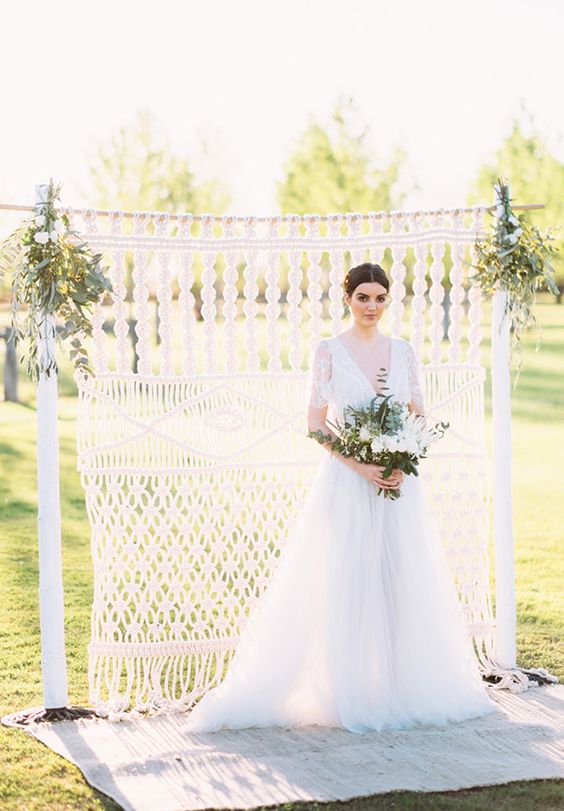 elegant white crochet backdrop arch