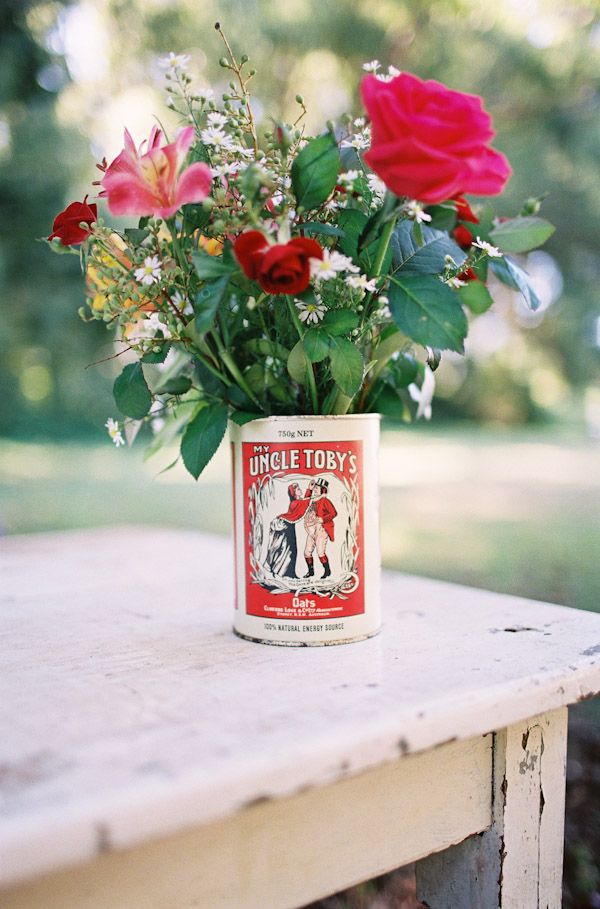 flowers in old tin center piece