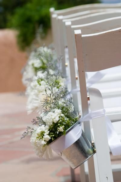 flowers in tin cans wedding decor