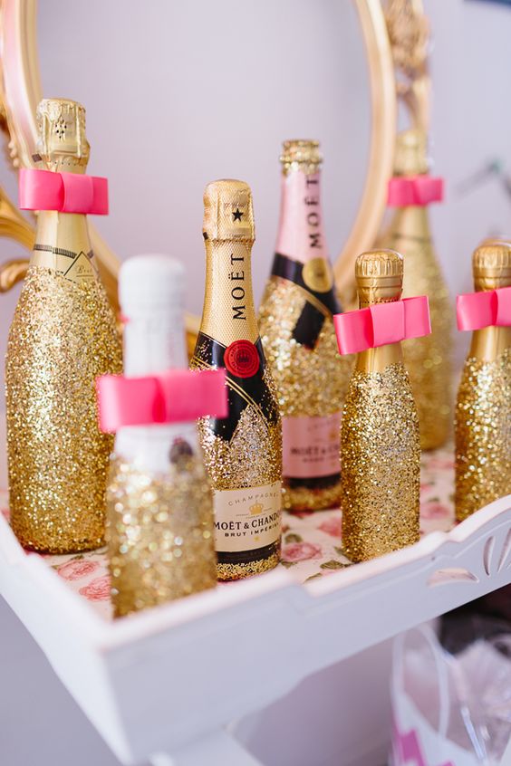 glitter over the champagne bottle labels