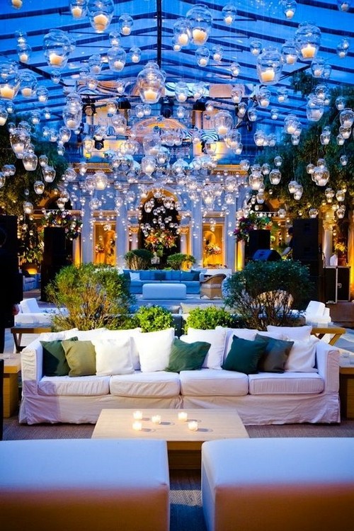 indoor wedding lounge with hanging candle lights