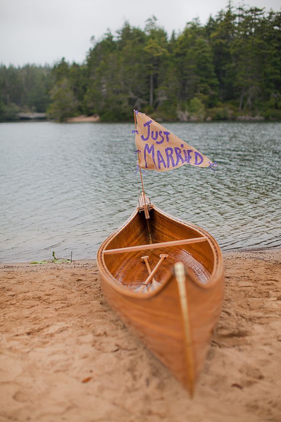 just married wedding canoe