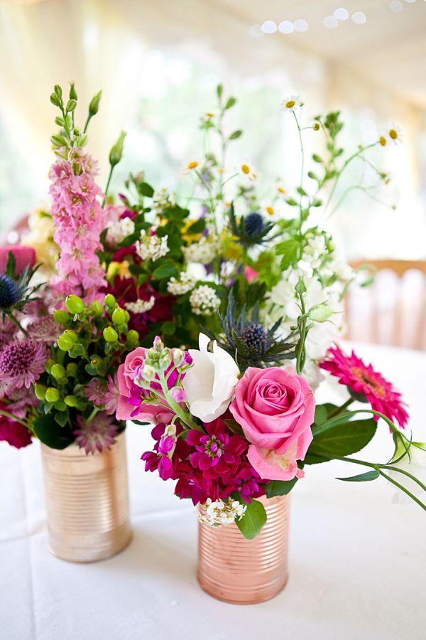 pink flowers in rose tin cans wedding centerpiece ideas