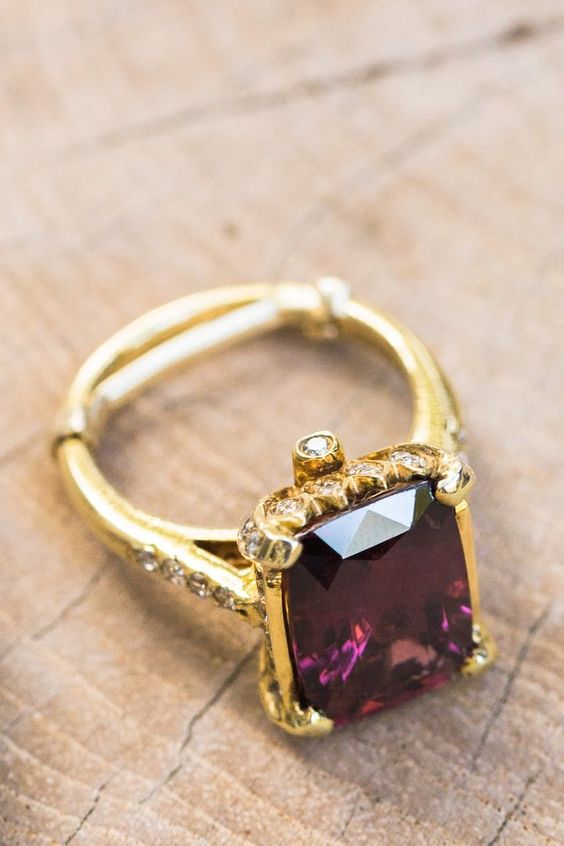 purple and gold striking engagement ring