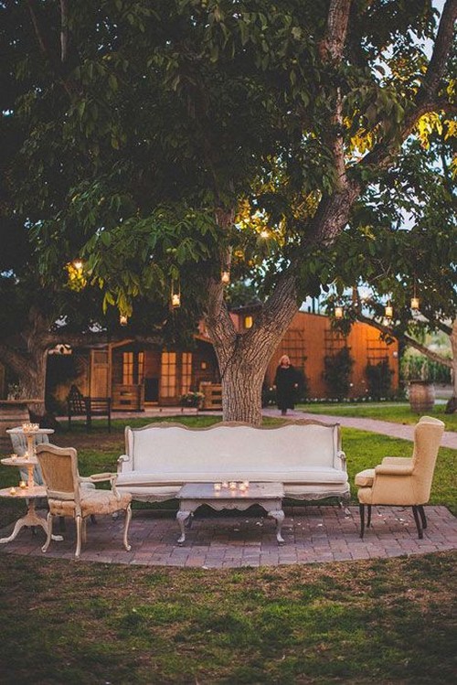 rustic backyard wedding lounge area
