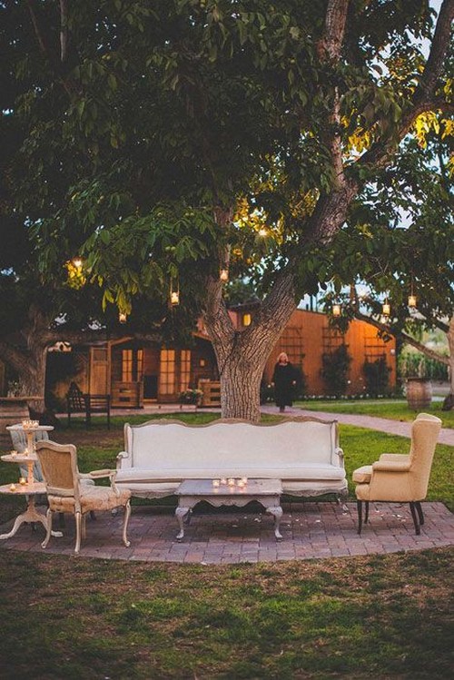 rustic backyard wedding lounge area