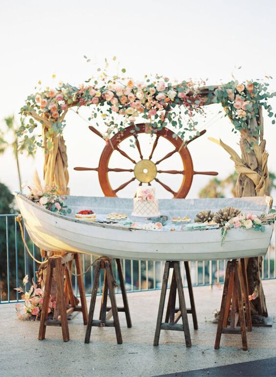 rustic beachy dessert bar and wedding backdrop