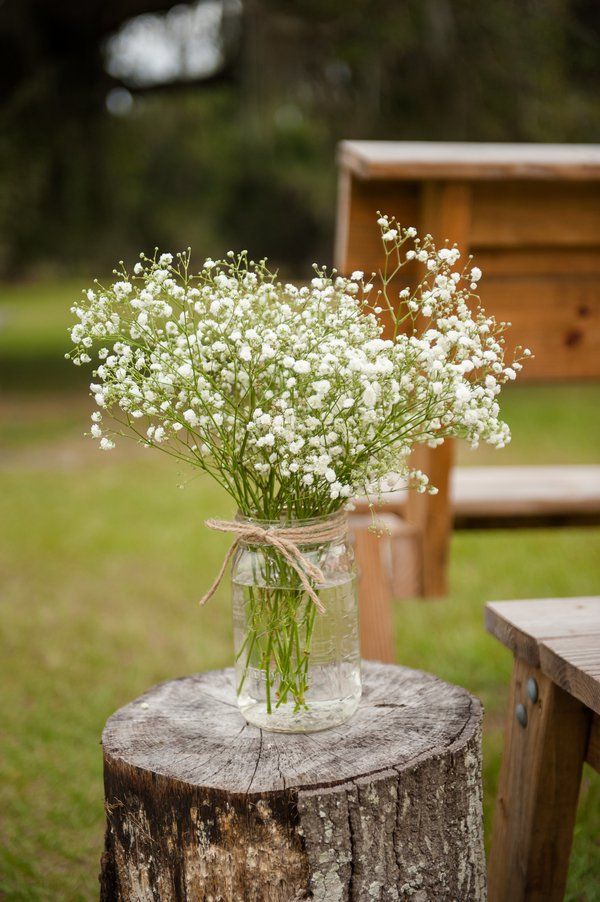 rustic country style wedding in a barn with cute details and elegant decorations