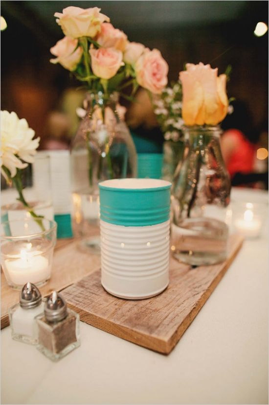 45+ Charming Inexpensive Country Tin Can Wedding Ideas 23 upcycled tin cans as candle lit luminaries