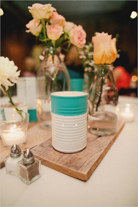 upcycled tin cans as candle lit luminaries