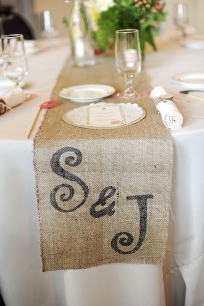 Burlap runners with a stenciled monogram