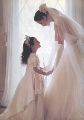 Cute Bride and Flower Girl pose.