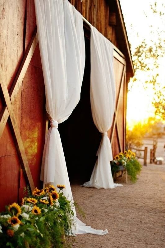 Hanging Drapery for a Barn Wedding Ceremony Reception