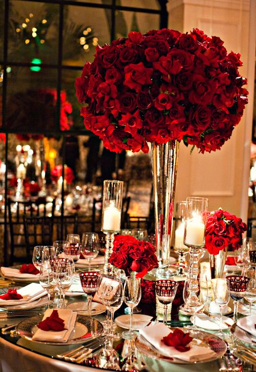 Incredible red rose centerpiece for glamorous wedding
