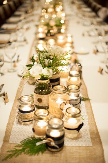 Military winter wedding, Devils thumb ranch, DIY, table center pieces, mason jars, candles, assorted sizes, romantic, warm lighting