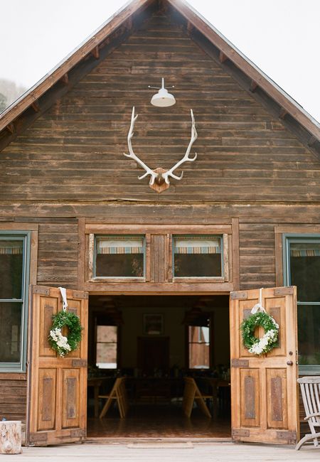 Mountain cabin wedding reception with antlers