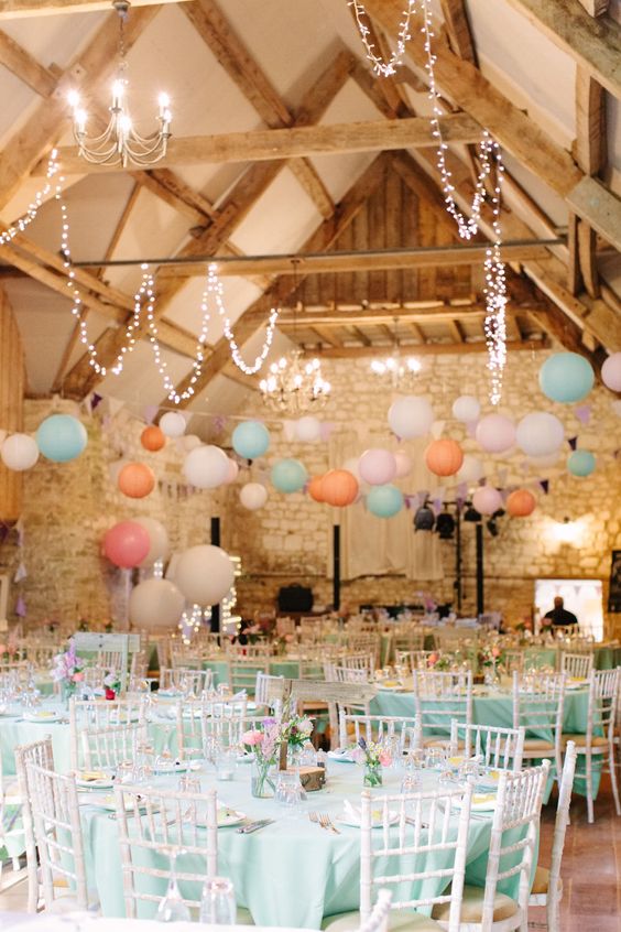 Pastel colour scheme decorated barn wedding venue