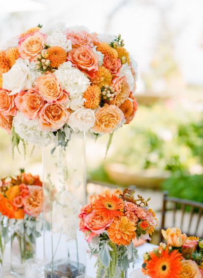 Peach and orange tall wedding flowers wedding centerpiece