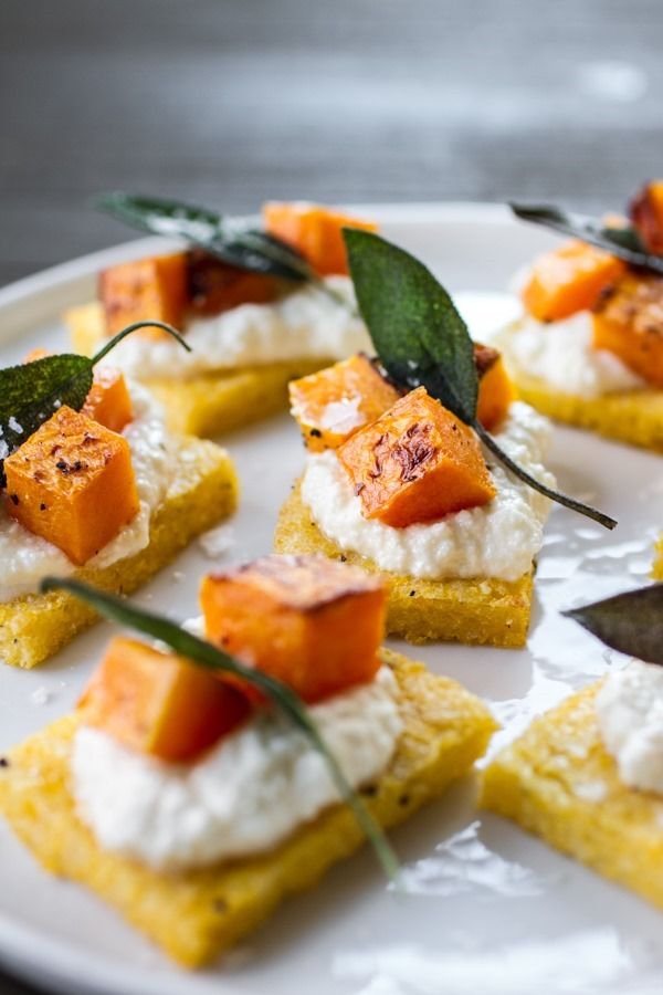 Polenta crostini with butternut squash ricotta and sage