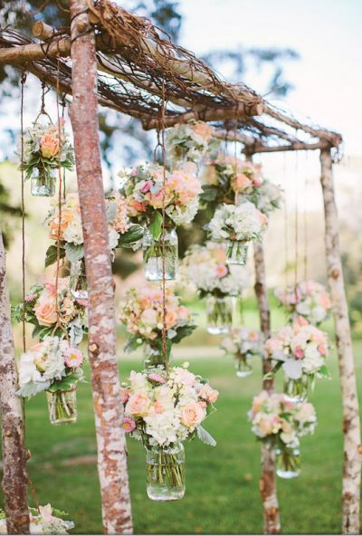 Rebecca Arthurs arbor flowers hanging mason jars