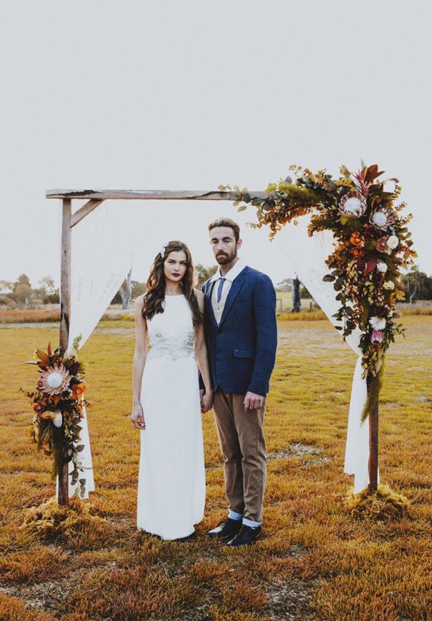 Rustic Boho Wedding Decor Ideas- wedding arch with native floral arrangements