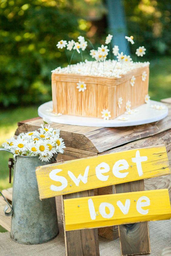 Rustic daisies wedding cake and sweet love sign