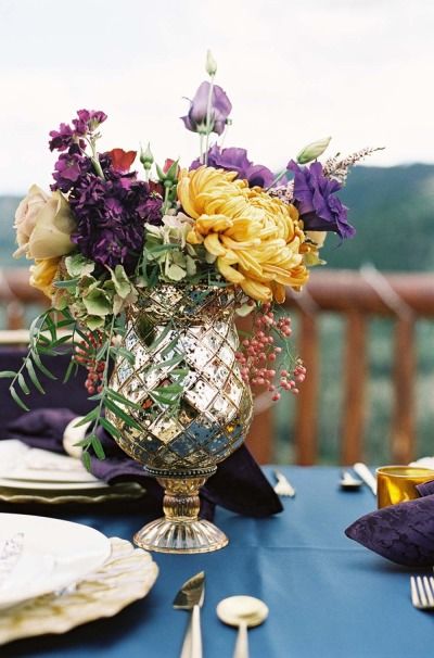 Rustic yellow and purple flower fall wedidng centerpieces