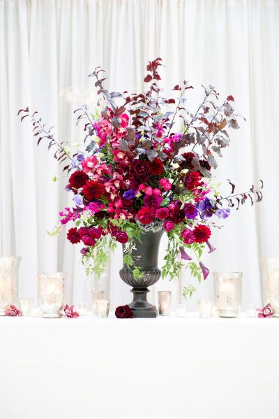 Tall berry hued blooms fall wedding centerpieces