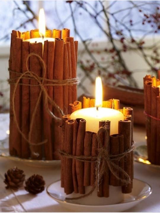 Tie cinnamon sticks around the candles