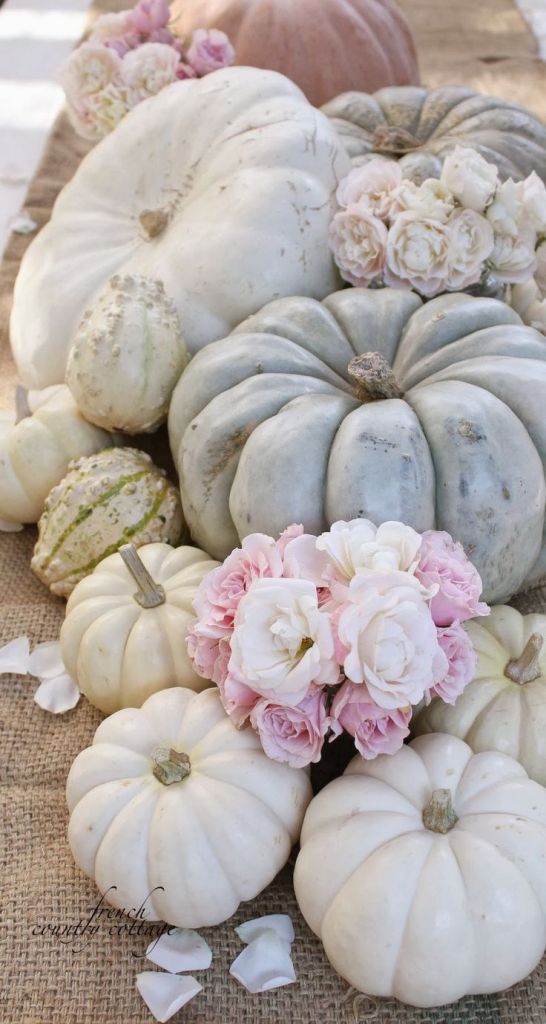 White yellow and orange pumpkins for centerpieces instead for fall wedding