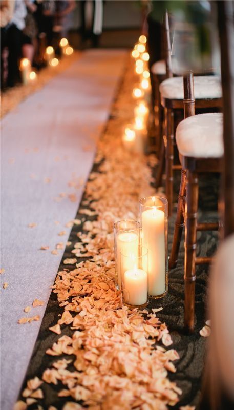 battery operated candles with rose petals ceremony aisle ideas