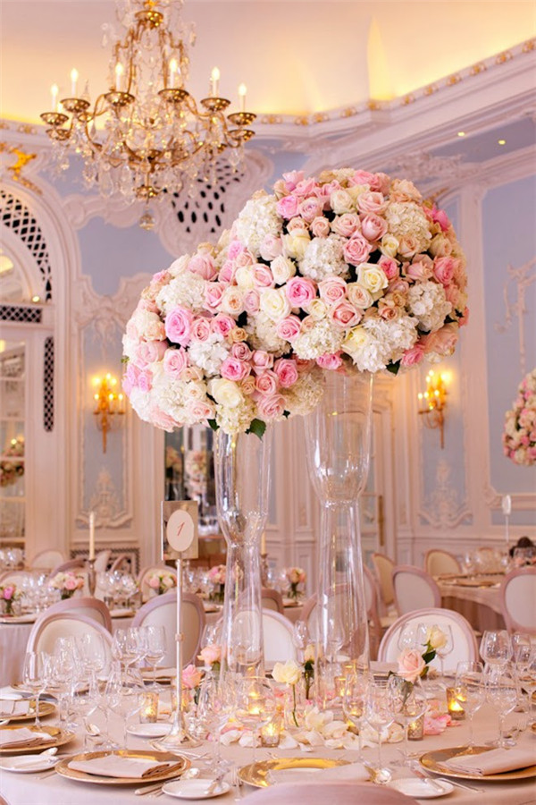 blig and tall pastel roses wedding reception centerpieces