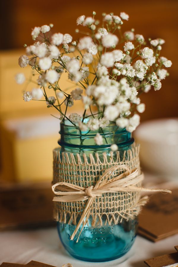 28 Ideas of Using Twine for Rustic Wedding 28 blue mason jars filled with baby's breath and wrapped with burlap