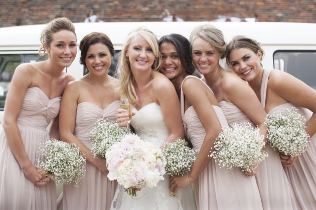 blush bridesmaid dresses - baby's breath bouquets